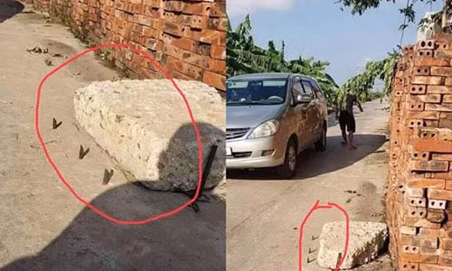 Dan cam chong sat quanh cuc be tong khien nhieu o to xit lop