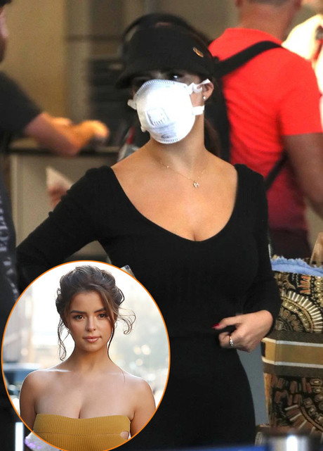 Nữ người mẫu Demi Rose đeo khẩu trang bảo hộ trong suốt quá trình làm thủ tục ở sân bay Los Angeles. Ảnh: Internet. Video "Minh Hằng chia sẻ về phong cách thời trang". Nguồn: VTC.