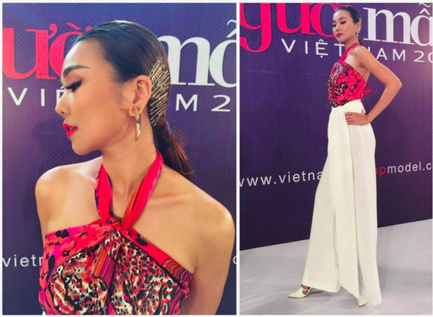 Thanh Hằng biến khăn lụa thành một thiết kế áo cổ yếm để phô diễn bờ vai trần cùng đôi xương quai xanh thanh mảnh, sắc nét của mình.