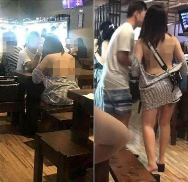 Cô gái trẻ ở Trung Quốc khiến tất cả mọi người trong nhà hàng sốc vì diện một chiếc áo hết sức kỳ quặc. Không rõ chiếc áo này là kiểu dáng cổ rộng hay trễ vai nhưng bên trong cô nàng còn không hề mặc áo lót hay đồ bảo hộ gì cả.