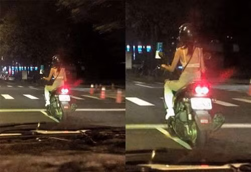 Trước đó, một cô gái trẻ tuổi khác cũng gây xôn xao dân mạng khi chỉ mặc một chiếc áo lót màu trắng với quần jean và lái xe máy giữa trời tối.