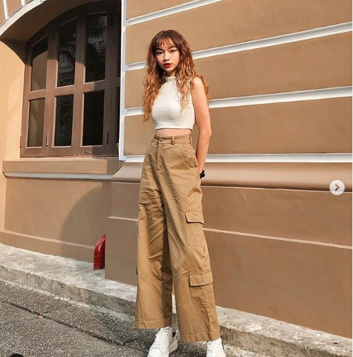 Gu thời trang cá tính của Trần Nhã Ca cũng được nhiều người đánh giá cao.