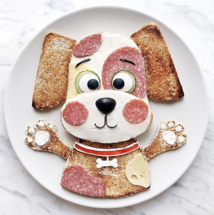  Bữa sáng hấp dẫn với tạo hình cún con, gồm bánh mì, thịt nguội và rau củ. 17. Trang trí thức ăn với cảm hứng thành phố đầy màu sắc.
