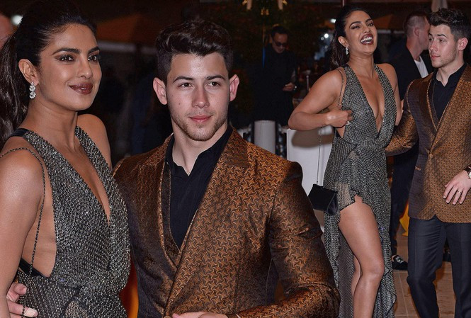 Nàng hậu Ấn Độ khiến người hâm mộ không khỏi xuýt xoa khi diện chiếc váy voan mỏng cắt xẻ gợi cảm, tình tứ sánh đôi bên chồng.