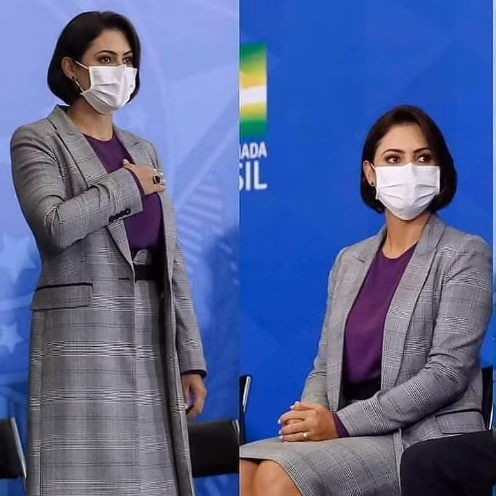 Phu nhân Tổng thống Brazil cũng không quên "bắt" trend màu tím của năm với chiếc áo tím phối cùng chân váy váo áo khoác dáng dài.