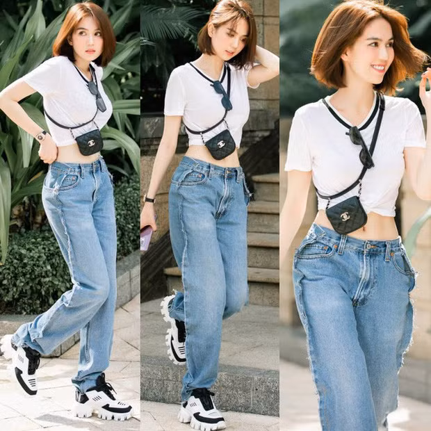 Street style mới nhất của nữ hoàng nội y vẫn là combo quần jeans + crop top khoe eo thon dáng chuẩn. Thiết kế "trước sau như một" khiến Ngọc Trinh từng bị hiểu lầm mặc ngược quần.