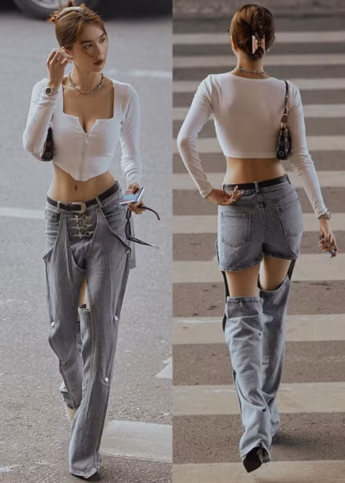 Vốn theo đuổi phong cách thời trang hở bạo, Ngọc Trinh không ngại thử những xu hướng mới lạ ít người dám mặc. Mới đây, nữ hoàng nội y xuống phố với chiếc quần jeans độc lạ vô cùng.
