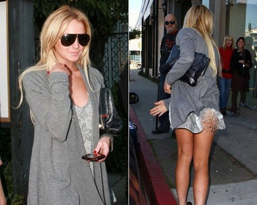 Lindsay Lohan mặc váy ngủ khá ngắn khi đi mua sắm, mặc dù có chiếc áo khoác mỏng nhưng vẫn gặp sự cố lộ vòng 3.