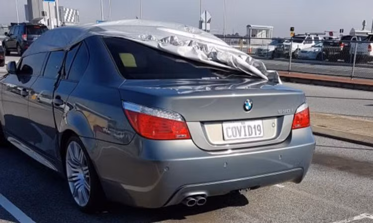 Giai ma bi an xe sang BMW mang bien so COVID 19-Hinh-2