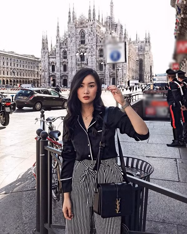 Chọn một chiếc áo sơ mi lụa dài tay kết hợp cùng với quần ống rộng, chị em đã có ngay một set đồ giúp bảo vệ làn da tối đa từ đầu đến chân.