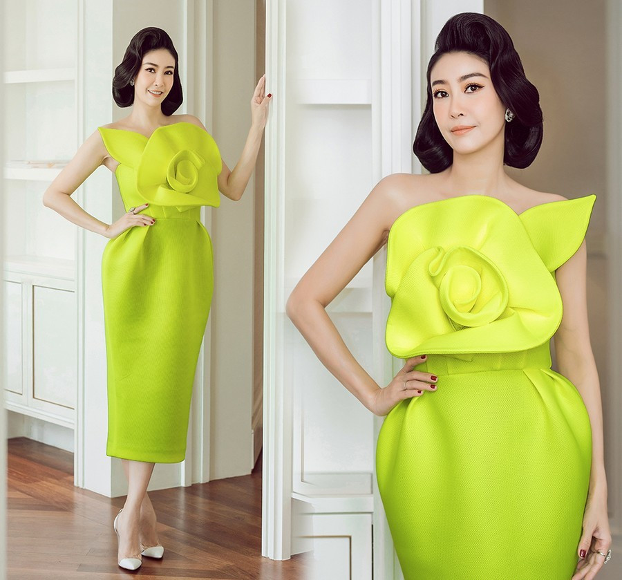 Hoa hậu Hà Kiều Anh nổi bật trong chiếc váy vàng neon, phối khuyên tai đính đá.