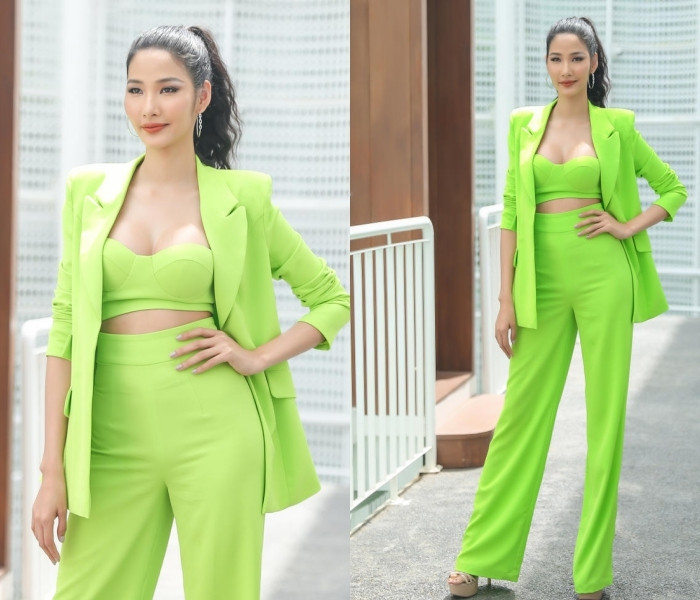 Hoàng Thuỳ nhanh nhạy trước xu hướng thời trang màu xanh neon vốn kén sắc da. Siêu mẫu tinh tế khi kết hợp bra cùng quần cạp cao khiến đôi chân thêm dài miên man.