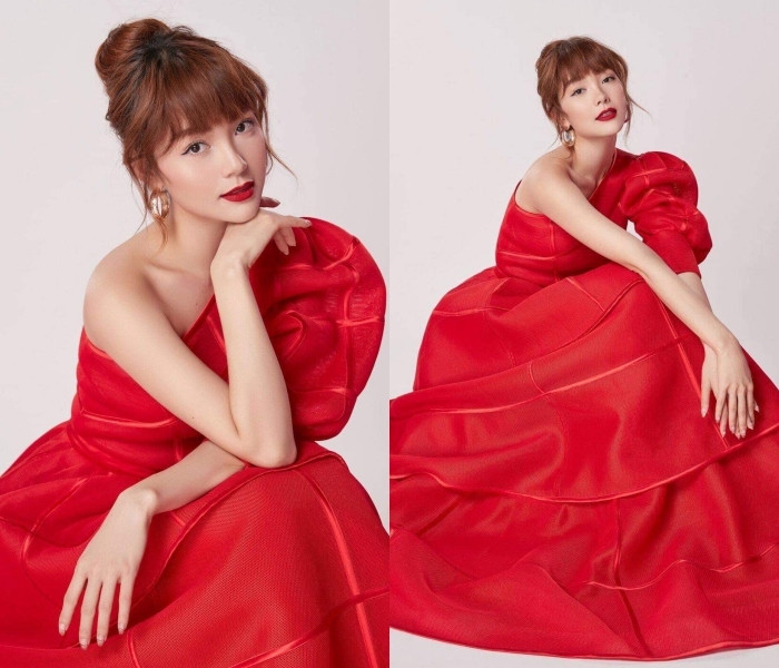 Nắm bắt xu hướng trang phục màu neon rực rỡ, Minh Hằng yêu kiều trong thiết kế váy bồng màu đỏ nhung rực rỡ.