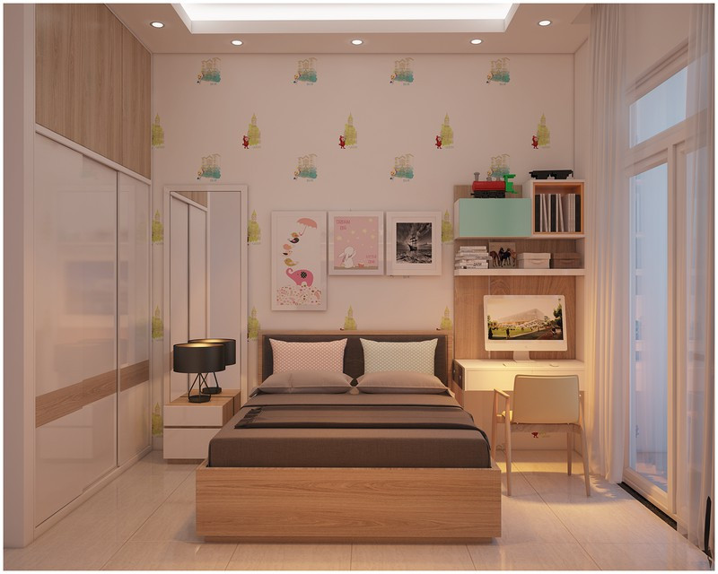 Giấy dán tường cùng kệ sách màu sắc được chọn theo sở thích của bé.