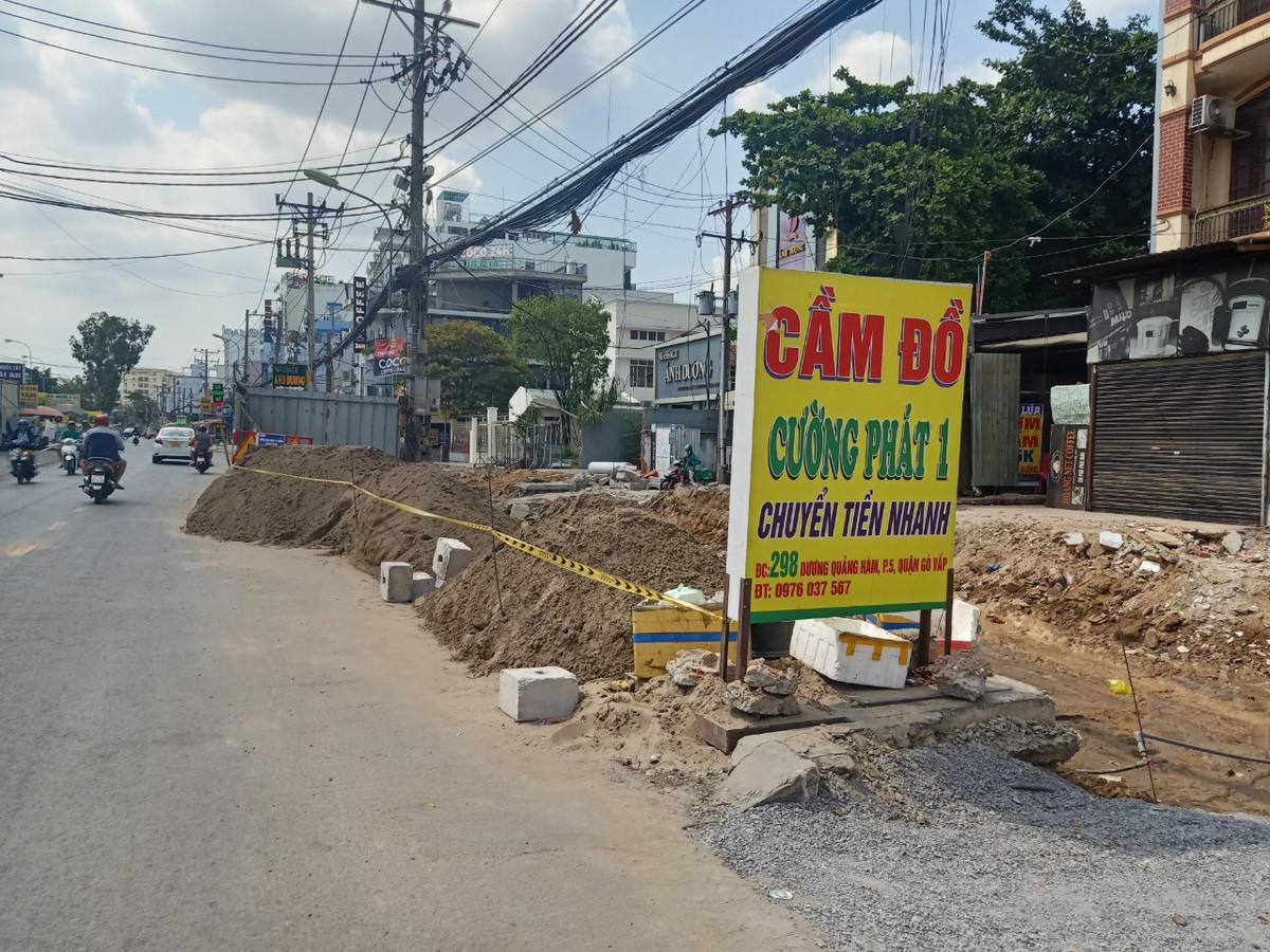 TP. HCM: Don vi nao dang thi cong duong Duong Quang Ham mo rong?-Hinh-3