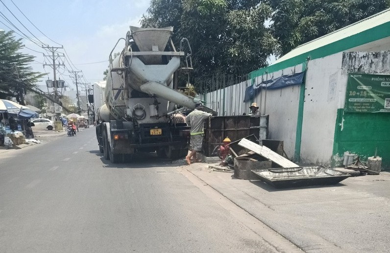 TP. HCM: Don vi nao dang thi cong duong Duong Quang Ham mo rong?-Hinh-5