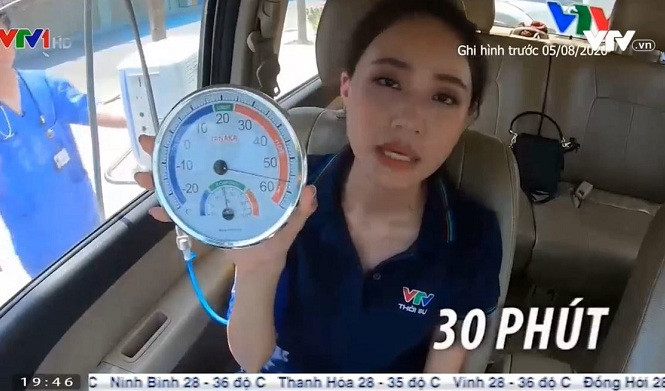 Xuan Anh dan ban tin thoi tiet trong o to nhiet do 57 do C