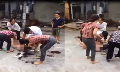 Xac dinh 5 nguoi danh ghen, lot do co gai tre giua duong