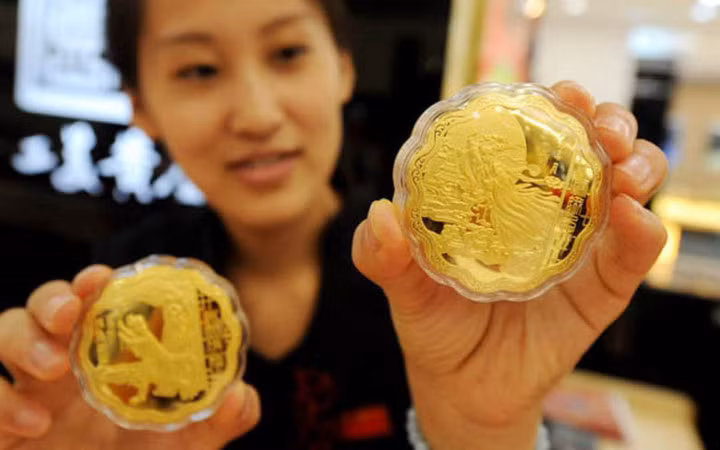 Trên mặt bánh có nhiều họa tiết đẹp mắt (Ảnh: China Daily)