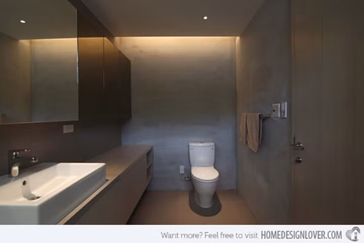 Mảng tường xám không chỉ giúp không gian này tone sur tone với toàn bộ căn hộ mà còn giữ sạch sẽ và có điểm nhấn hơn.