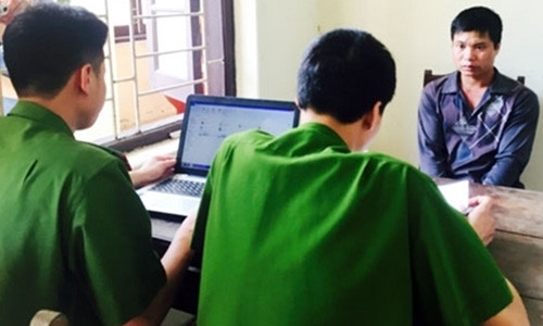 Bị cáo Đinh Quang Tặng tại cơ quan công an.