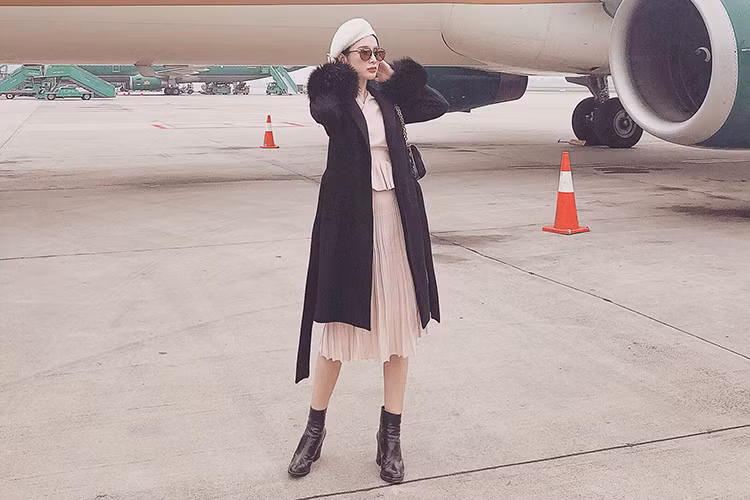 Angela Phương Trinh đáp chuyến bay ra Hà Nội và có cơ hội tận hưởng cái giá lạnh của Hà Nội.