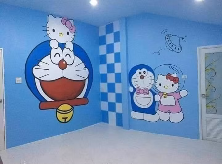 Chủ nhân của ngôi nhà có lẽ là người hâm mộ chú mèo ú Doraemon khi tất cả các hình ảnh của chú mèo máy được vẽ lên rất chuẩn tỉ lệ và có hồn giống y bản gốc.