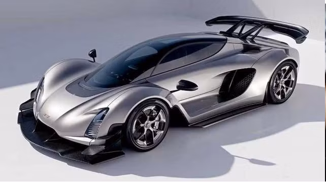 In 3D xe hơi. Trong ảnh là siêu xe in 3D sử dụng động cơ hybrid có công suất 1.233 mã lực, tăng tốc từ 0 - 100 km/h trong 1,9 giây. Trên thế giới, rất ít xe có khả năng tăng tốc chỉ trong thời gian ngắn như vậy. Tốc độ tối đa của chiếc siêu xe này lên tới trên 400 km/giờ.