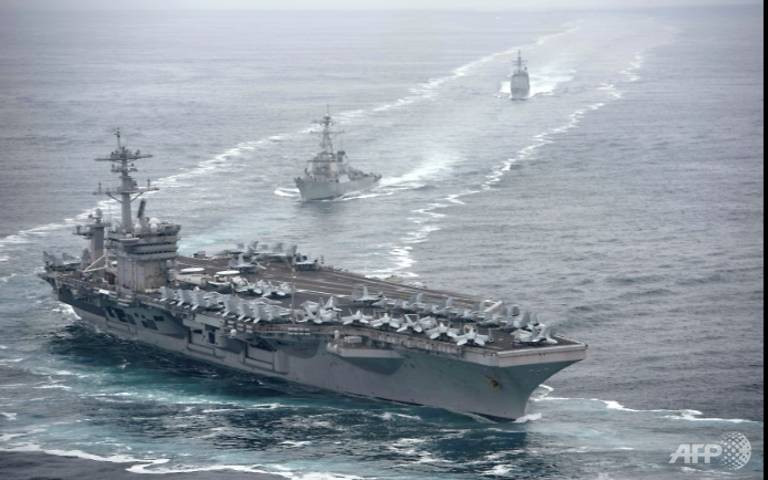 USS Theodore Roosevelt cũng là tàu sân bay đầu tiên của Hải quân Mỹ phát hiện ra thuỷ thủ đoàn dương tính ngay khi còn đang lênh đênh trên biển. Trước đó những ca dương tính khác của Hải quân Mỹ đều chỉ được phát hiện sau khi thuỷ thủ đoàn đã lên bờ. Nguồn ảnh: USNavy.