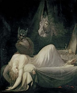 Khi đang ngủ, quái vật Kanashibari bất ngờ nhảy ra và ghì chặt người xuống giường.