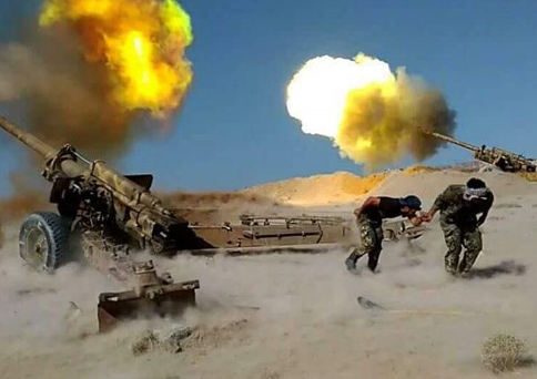 "Quân đội Syria, do Quân đoàn số 5 và Vệ binh Cộng hòa dẫn đầu, liên tục nã tên lửa về phía các tuyến phòng thủ và căn cứ của nhóm phiến quân tại nhiều thị trấn ở khu vực phía nam và tây tỉnh Idlib", AMN đưa tin. Ảnh: IIT.