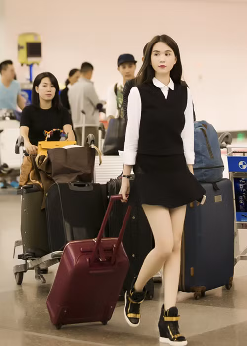 Gu thoi trang san bay hut mat cua nguoi mau Ngoc Trinh-Hinh-12