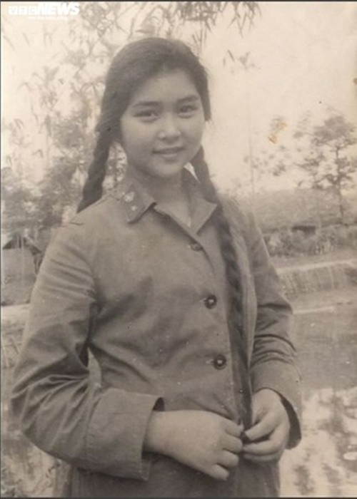 Nghệ sĩ Thanh Loan để tóc dài, tết hai bên. Ảnh: VTC News