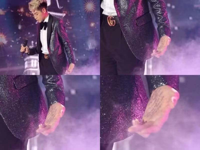 Cận cảnh bàn tay chi chít chữ của Đức Phúc. Ảnh: Giao thông