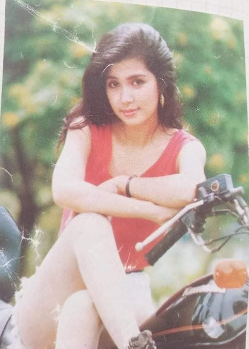 Nhìn lại ảnh thanh xuân, Việt Trinh cho biết, điều cô tiếc nuối nhất là mái tóc nay không còn bồng bềnh như xưa. Ảnh: FBNV