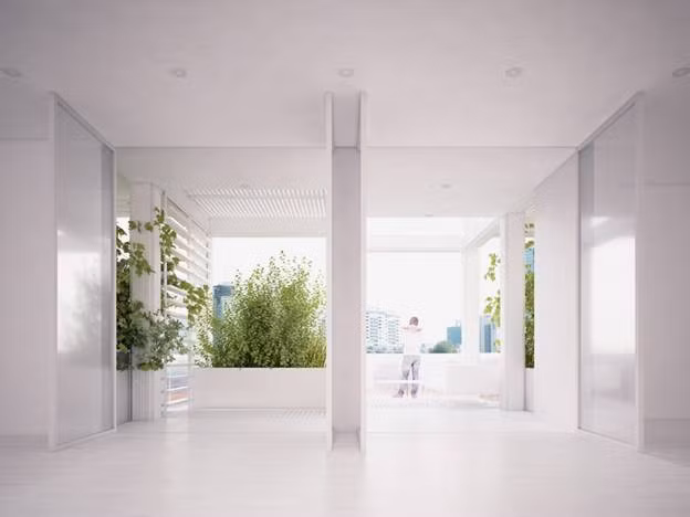 Thảm thực vật của tòa nhà mang đến không khí trong lành, trong khi ban công mở tạo sự lưu thông gió tự nhiên.