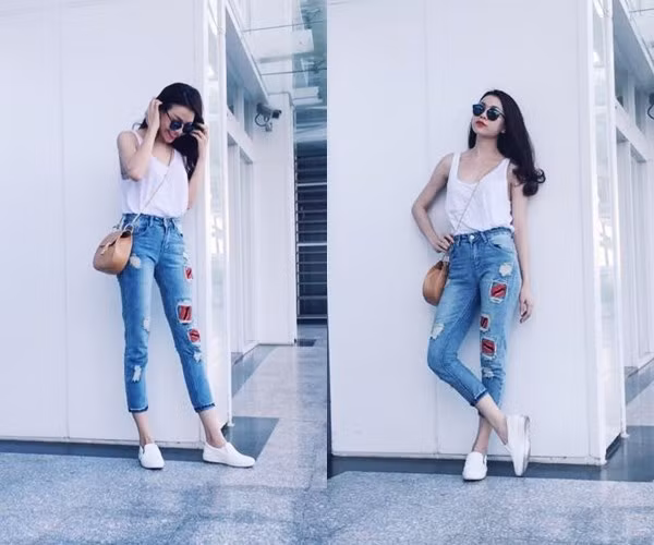 Trà Ngọc Hằng phối áo tank trắng cùng quần jeans rách phủi bụi, không quên diện cùng đôi giày lười năng động.