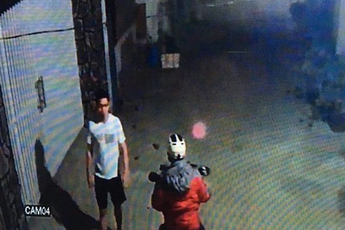 Hình ảnh nghi can Minh sau khi gửi xe cướp của nạn nhân tại Toà nhà The Manor