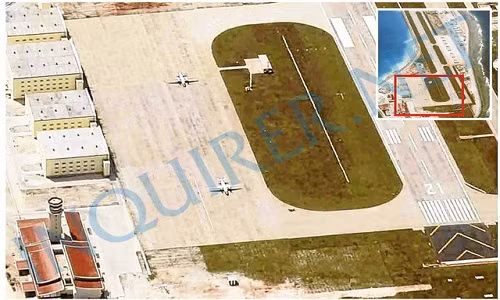 Hai máy bay vận tải quân sự của Trung Quốc được phát hiện ở đá Vành Khăn, quần đảo Trường Sa trong một bức ảnh được chụp vào ngày 6-1-2018 - Ảnh: DAILY INQUIRER