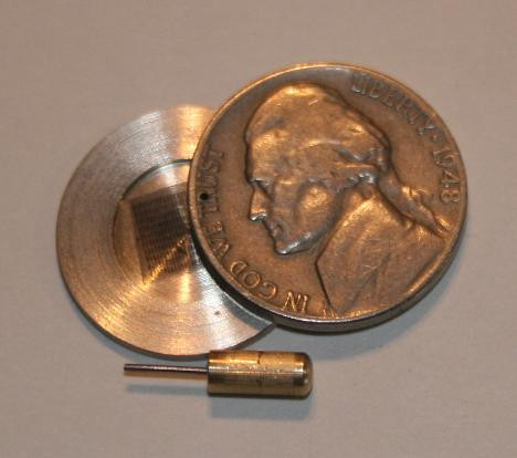 Những đồng xu của điệp viên Liên Xô có thể giấu các “microfilm và microdot” - các tài liệu dưới dạng văn bản hoặc hình ảnh đã được thu nhỏ dung lượng.