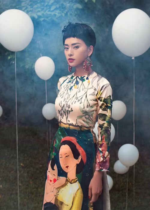 Ngô Thanh Vân chứng tỏ dù cắt tóc ngắn cá tính vẫn trông duyên dáng trong tà áo dài truyền thống.