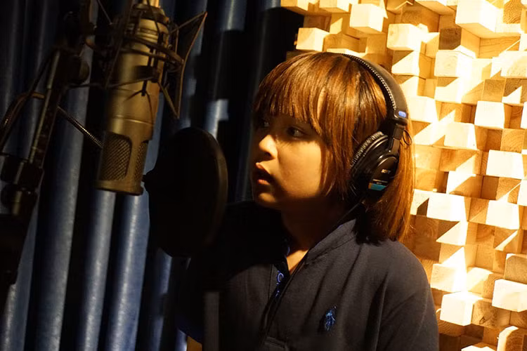 Giọng ca nhí đến từ TP HCM từng giành được học bổng tại trường âm nhạc của nhạc sĩ Đức Trí nhờ khả năng sáng tác và trình diễn ấn tượng.