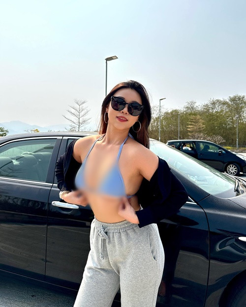 Wing Tung Suen cởi áo khoe nội y khi xuống phố.