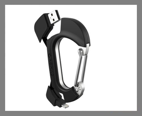 NomadClip không chỉ cho phép bạn cất toàn bộ chìa khóa mà còn có cả cáp sạc chuyển đổi Lightning sang USB tích hợp. Nhờ đó, người dùng dễ dàng sạc iPhone hoặc truyền dữ liệu với máy tính. Ảnh: Business Insider.