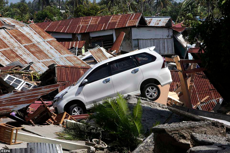 Kinh hoàng ngôi làng Indonesia bị “xóa sổ” sau thảm họa kép - Hình 8 Kinh hoang ngoi lang Indonesia bi “xoa so” sau tham hoa kep-Hinh-8