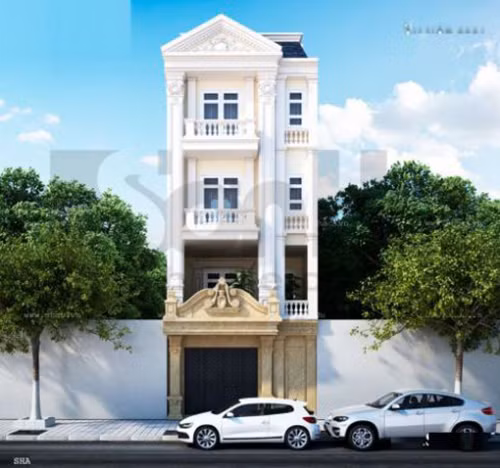 Màu trắng tầng trên kết hợp màu vàng tầng 1 tạo nên dáng vẻ sang trọng của ngôi nhà. Ảnh: Datbinhduong.