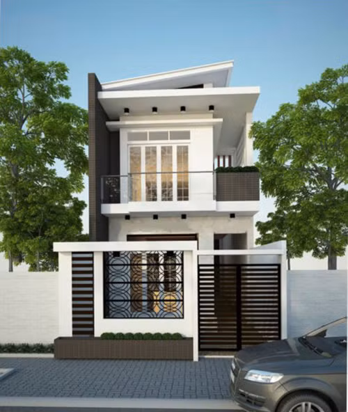  Nhà phố 2 tầng được thiết kế theo kiểu mái lệch tránh tạo sự đơn điệu cho phần mái của ngôi nhà. Ảnh: Thietkethicongnhadep.