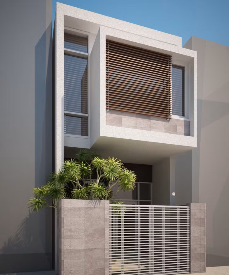 Công trình nhà ống 2 tầng đơn giản, tinh tế có giếng trời giữa nhà mang ánh sáng cho mọi vị trí. Ảnh: Tda.