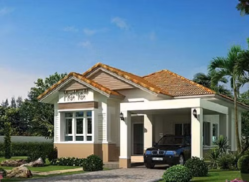 Hệ mái kép và chỗ để ô tô rộng thoáng phía trước là điểm nổi bật nhất của căn nhà. Ảnh: Nhabinhduong.