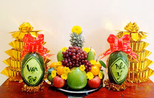 Mâm ngũ quả có nhiều cách sắp xếp (Ảnh: KT)